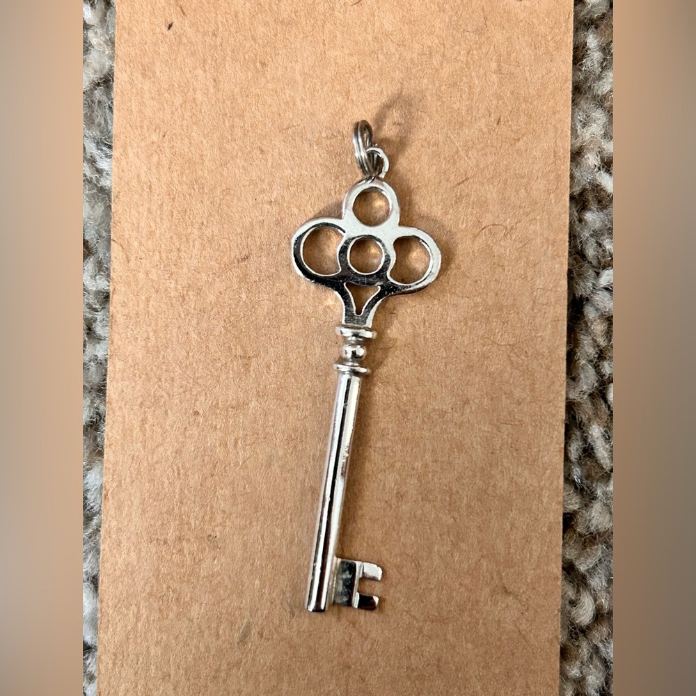 Elegant Silver Key Pendant